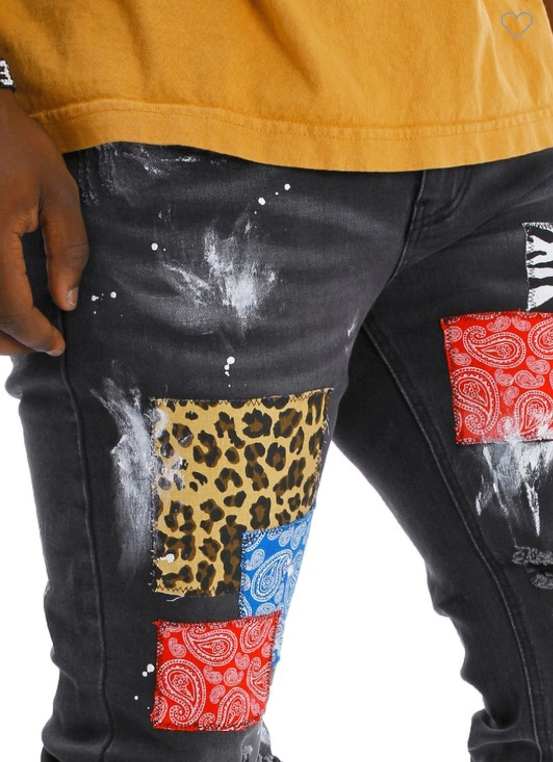 MULTIPLE PATCHES RIPS JEANS