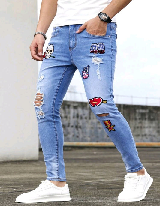 HEART AND SKULL PATCHED RIPED SKINNY JEANS