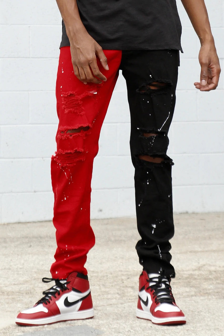 BLACK RED PAINT SPLATTER CONTRAST STACKED JEAN'S