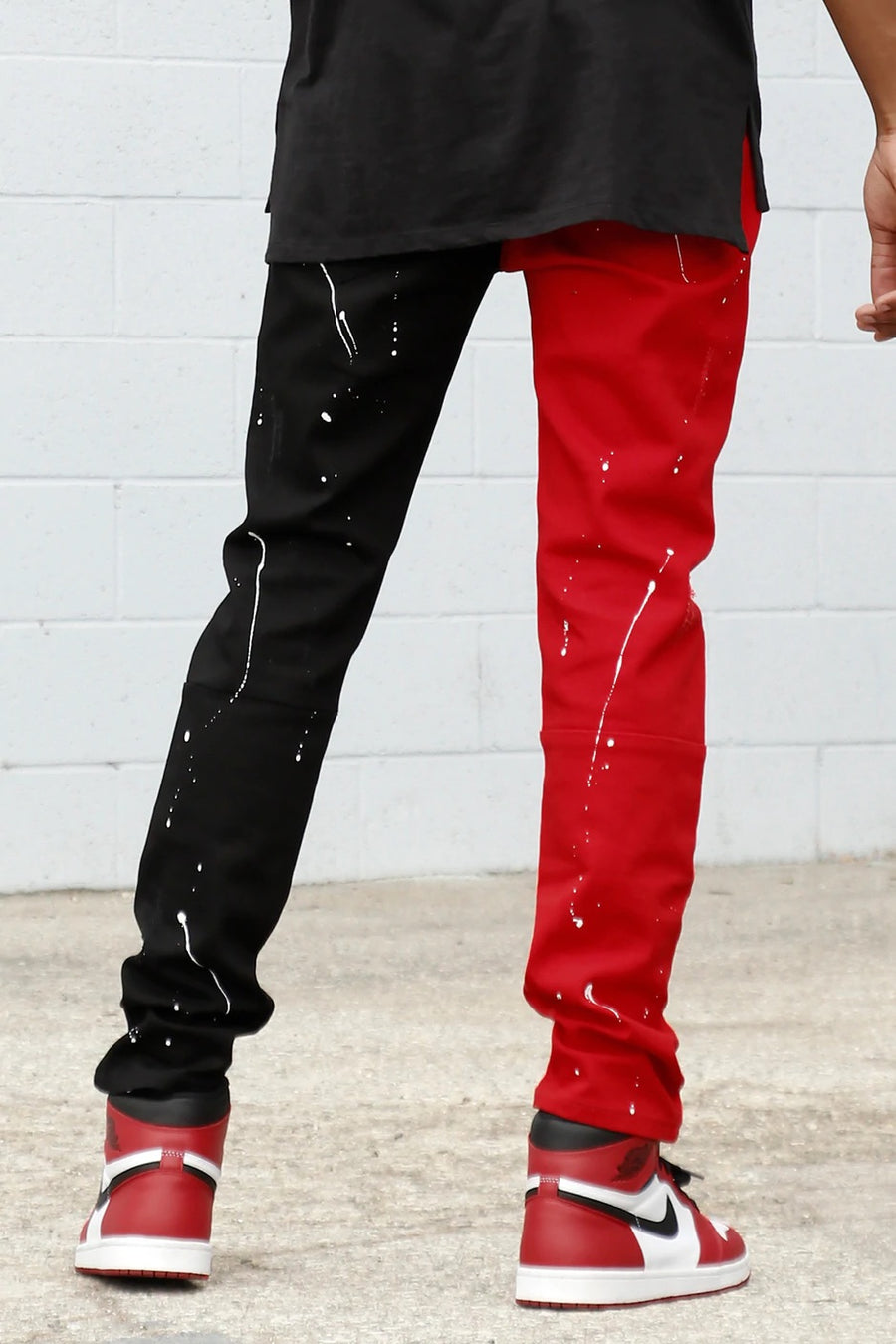 BLACK RED PAINT SPLATTER CONTRAST STACKED JEAN'S